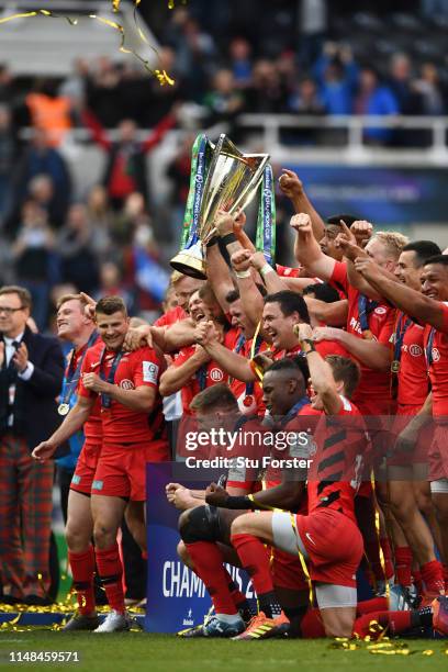 Saracens players celebrate following the Champions Cup Final match between Saracens and Leinster at St. James Park on May 11, 2019 in Newcastle upon...