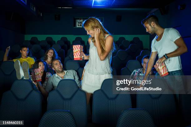 amigos en una sala de cine - theatre in pisa fotografías e imágenes de stock