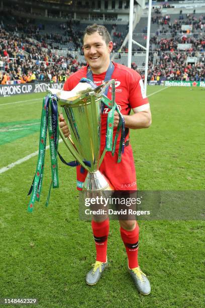 Alex Goode of Saracens celebrates with the trophy following the Champions Cup Final match between Saracens and Leinster at St. James Park on May 11,...