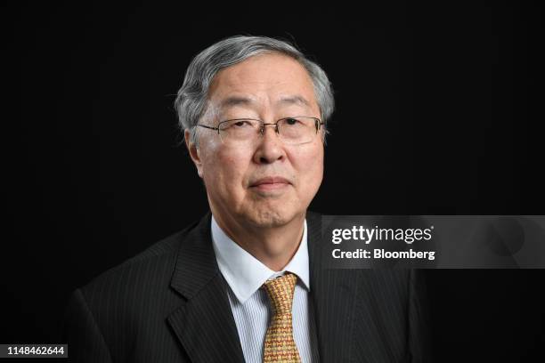 Zhou Xiaochuan, former governor of the People's Bank of China, poses for a photograph following a Bloomberg Television interview at the St....