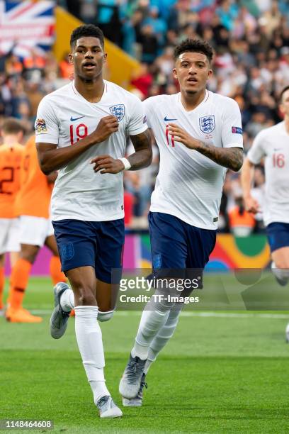 Marcus Rashford of England celebrates after scoring his team's first goal with Jadon Sancho of England during the UEFA Nations League Semi-Final...