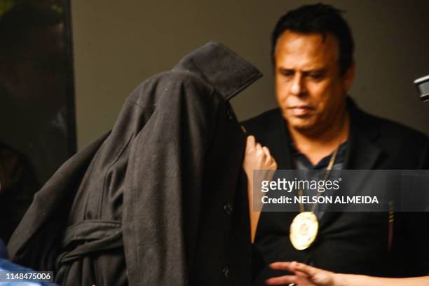 Najila Trindade Mendes de Souza arrives at the Women's Defense Precinct in Sao Paulo, Brazil on June 7, 2019. - Trindade Mendes de Souza appeared...