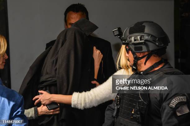 Najila Trindade Mendes de Souza arrives at the Women's Defense Precinct in Sao Paulo, Brazil on June 7, 2019. - Trindade Mendes de Souza appeared...