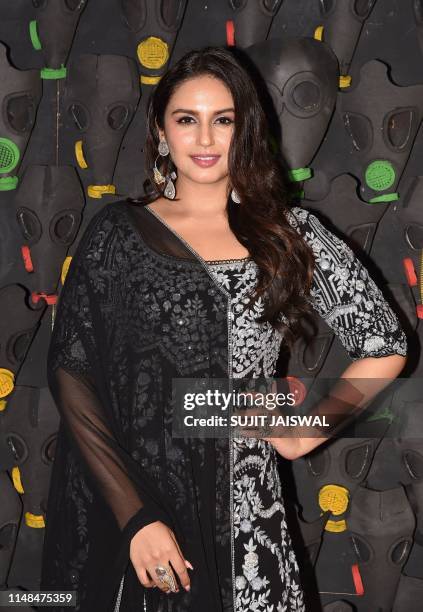 Indian Bollywood actress Huma Qureshi poses for photographs as she attends the premiere of the Netflix's Indian original series 'Leila' in Mumbai on...