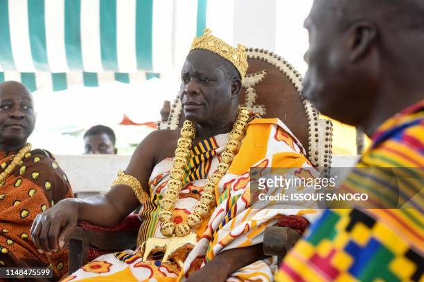 Amon N'Douffou V, king of Sanwi in southeastern Ivory Coast, attends an event on May 30, 2019. - King Amon N'Douffo V has pledged on April 16 to make...