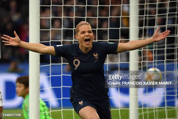 France's forward Eugenie Le Sommer celebrates after scoring a goal during the France 2019 Women's World Cup Group A football match between France and...