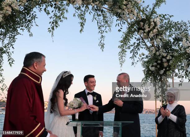 Turkish President Recep Tayyip Erdogan and his wife Emine Erdogan attend the wedding ceremony of football player Mesut Ozil of Arsenal FC and Amine...