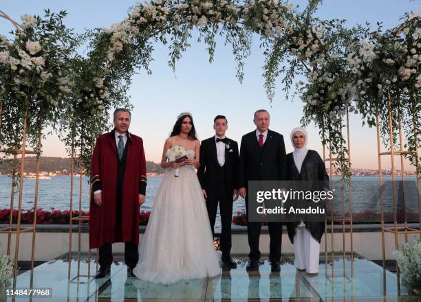 Turkish President Recep Tayyip Erdogan and his wife Emine Erdogan attend the wedding ceremony of football player Mesut Ozil of Arsenal FC and Amine...