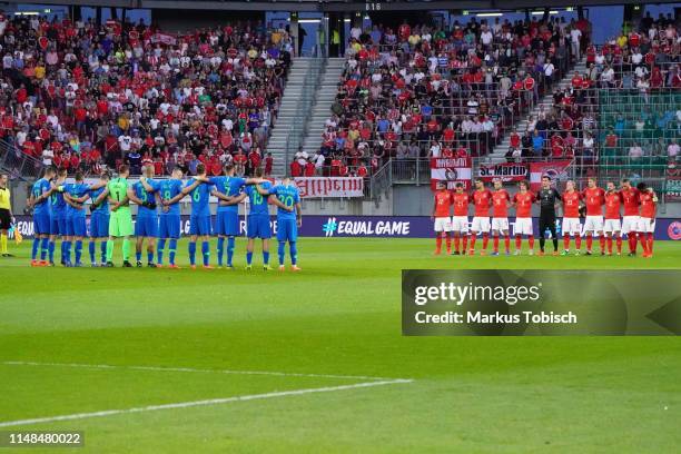 Players of Slovenia and Austria line up prior to the UEFA Euro 2020 Qualifier match between Austria and Slovenia at Woerthersee Stadion on June 7,...