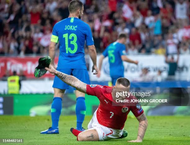 Austria's Marko Arnautovic reacts during the UEFA Euro 2020 group G qualifying football match between Austria and Slovenia at the Woerthersee Stadion...