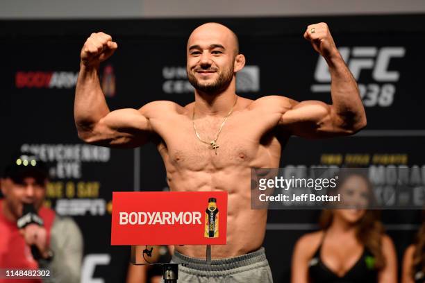 Marlon Moraes of Brazil poses on the scale during the UFC 238 weigh-in at the United Center on June 7, 2019 in Chicago, Illinois.