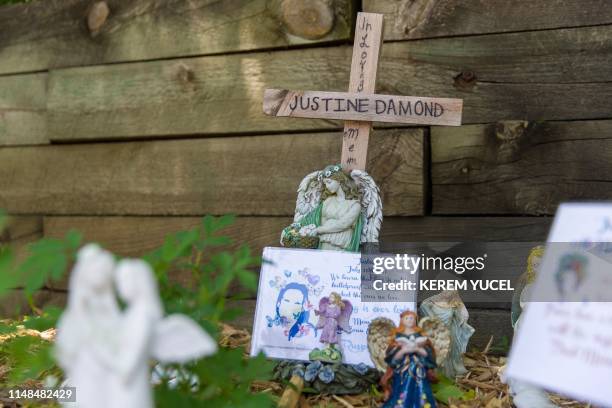 Memorial for Justine Damond is seen near the alleyway were she was found dead in Minneapolis, Minnesota on June 7,2019. A former Minneapolis police...