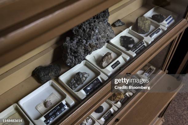 Various samples of rock and ore pulled from the Mountain Pass mine, operated by MP Materials, are displayed at the company's offices in Mountain...