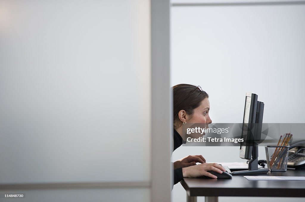 USA, New Jersey, Jersey City, Portrait of young woman in office