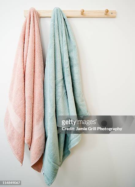 usa, new jersey, jersey city, towels hanging on rack - towel imagens e fotografias de stock
