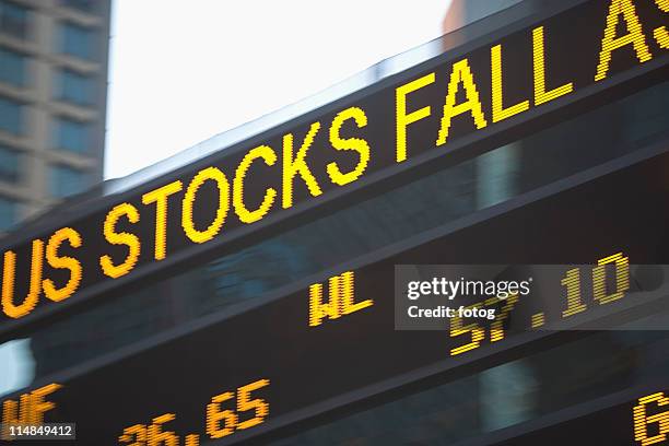 usa, new york state, new york city, times square, stock quotron, close-up - ticker tape machine stock pictures, royalty-free photos & images