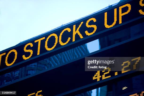 usa, new york state, new york city, times square, stock quotron, close-up - ticker tape machine stock pictures, royalty-free photos & images