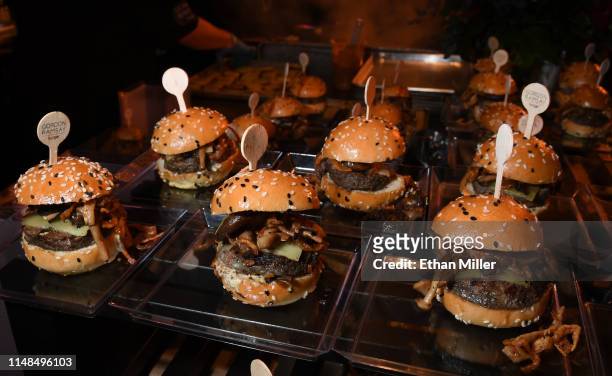 Stout burgers are served at the Gordon Ramsay Burger booth at the 13th annual Vegas Uncork'd by Bon Appetit Grand Tasting event presented by the Las...