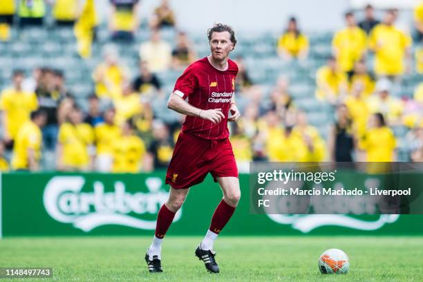 Steve McManaman of Liverpool FC runs with the ball during the match between Liverpool Legend and Borussia Dortmund Legend at Hong Kong stadium on...