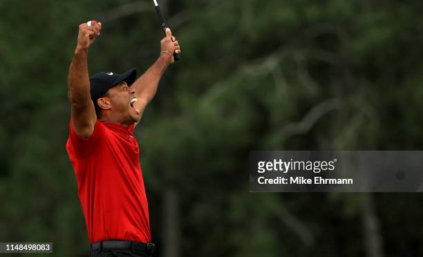 Tiger Woods of the United States celebrates winning the Masters during the final roubnd at Augusta National Golf Club on April 14, 2019 in Augusta,...