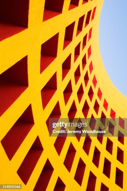 windows in wall of curved, modern building - mexico color stock pictures, royalty-free photos & images