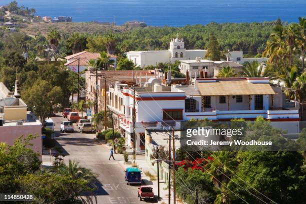 road and rooftops of town - todos santos stockfoto's en -beelden