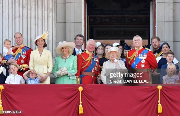 Britain's Prince William, Duke of Cambridge holding Prince Louis, Prince George, Princess Charlotte, Britain's Catherine, Duchess of Cambridge,...
