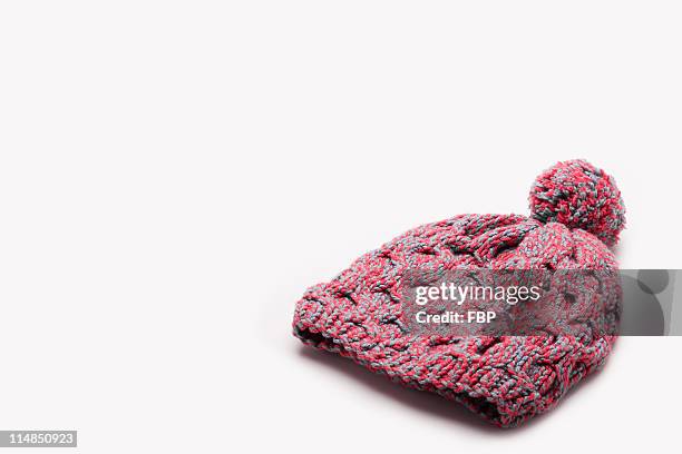 pink wooly hat - winter hat stock pictures, royalty-free photos & images