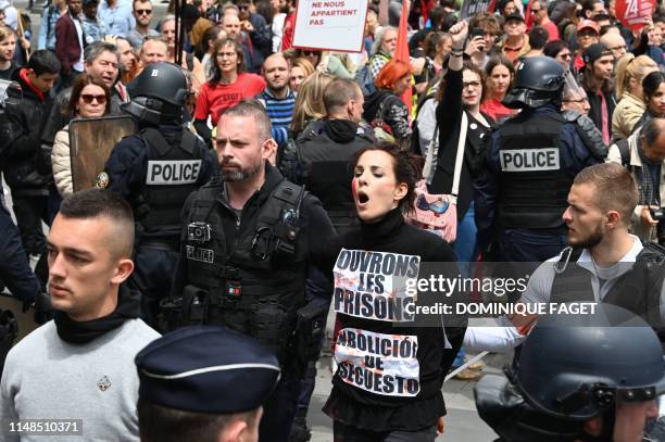 Police arrest activist Solveig Halloin during a demonstration calling for the closure of slaughterhouses taking place at the Place de la Republique...