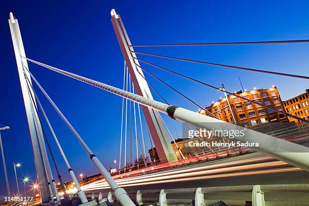usa, wisconsin, milwaukee, suspension bridge at night - milwaukee stock-fotos und bilder