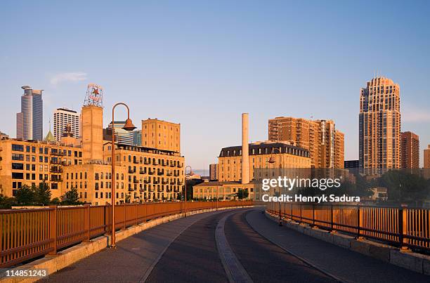 usa, minneapolis, minnesota, bridge near downtown - minneapolis cityscape stock pictures, royalty-free photos & images