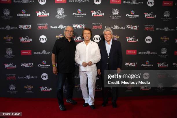 Edward James Olmos, Raphael, and Enrique Cerezo before the press conference to present the winner of the 2019 Platino Honorary Award on May 11, 2019...