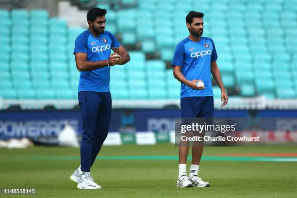 Vijay Shankar and Bhuvneshwar Kumar in action during the India Nets Session at The Oval on June 8, 2019 in London, England.