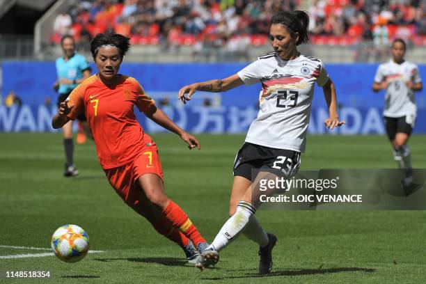 Germany's defender Sara Doorsoun vies for the ball with China's forward Shuang Wang during the France 2019 Women's World Cup Group B football match...