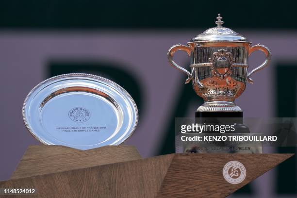 Second-placed trophy for Czech Republic's Marketa Vondrousova and the Suzanne Lenglen trophy for winner Australia's Ashleigh Barty are displayed...