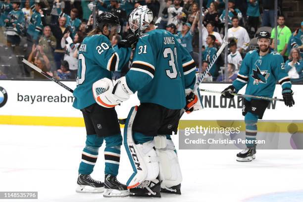 Martin Jones of the San Jose Sharks celebrates with Marcus Sorensen after defeating the St. Louis Blues in Game One of the Western Conference Finals...