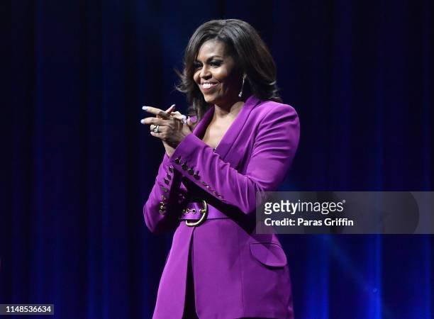 Former First Lady Michelle Obama attends 'Becoming: An Intimate Conversation with Michelle Obama' at State Farm Arena on May 11, 2019 in Atlanta,...