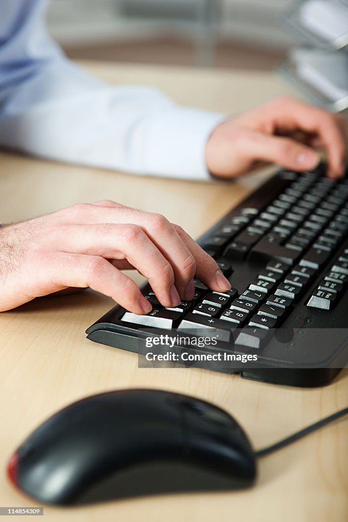 Office Worker Using Computer High-Res Stock Photo - Getty Images