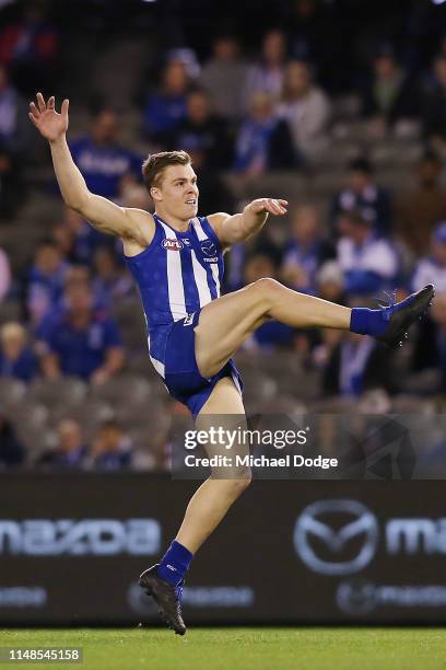 Cameron Zurhaar of the Kangaroos kicks the ball during the round eight AFL match between the North Melbourne Kangaroos and the Geelong Cats at Marvel...