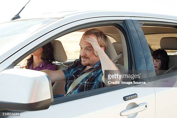 family driving in car - emotional stress family stock pictures, royalty-free photos & images