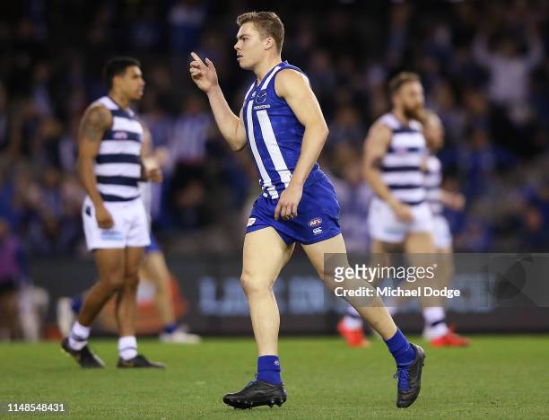 Cameron Zurhaar of the Kangaroos celebrates a goal during the round eight AFL match between the North Melbourne Kangaroos and the Geelong Cats at...
