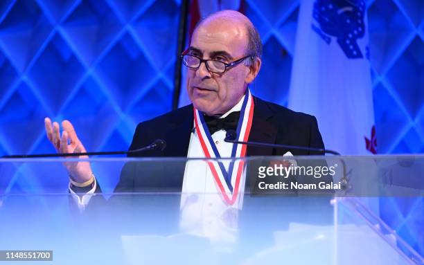 Muhtar Kent speaks on stage the 34th Annual Ellis Island Medals Of Honor Ceremony hosted by EIHS at Ellis Island on May 11, 2019 in New York City.