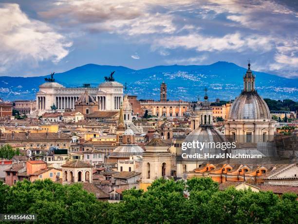 city view and colosseum, national monument to victor emmanuel ii and capitoline hill, rome, lazio, italy - rome colosseum stock pictures, royalty-free photos & images