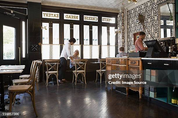 people in cafe - waiter new york stock pictures, royalty-free photos & images