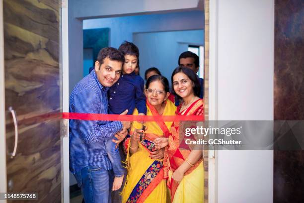 new home ribbon cutting ceremony - mumbai daily life stock pictures, royalty-free photos & images