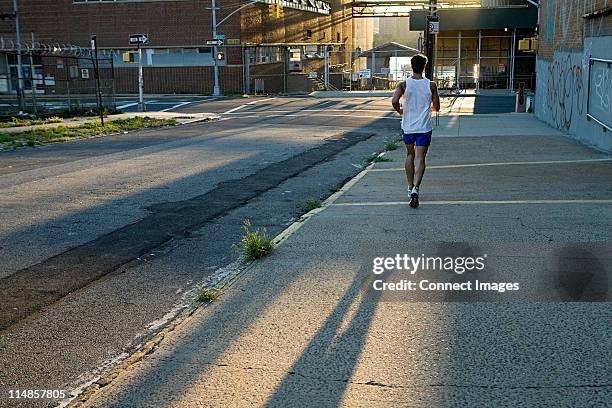 Running Single Man One Man Running New York City Photos and Premium High Res Pictures ...