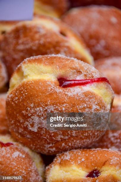 donuts on a street market stall - raspberry jam stock pictures, royalty-free photos & images