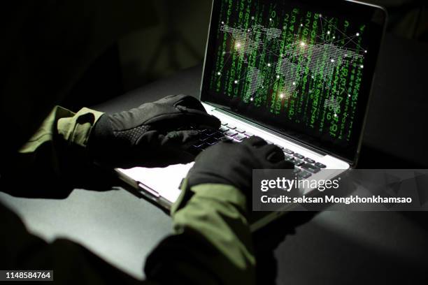 diverse computer hacking shoot - cyber attack stock pictures, royalty-free photos & images