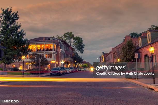 colorful sunset over historic district of saint charles missouri - company town hall stock pictures, royalty-free photos & images