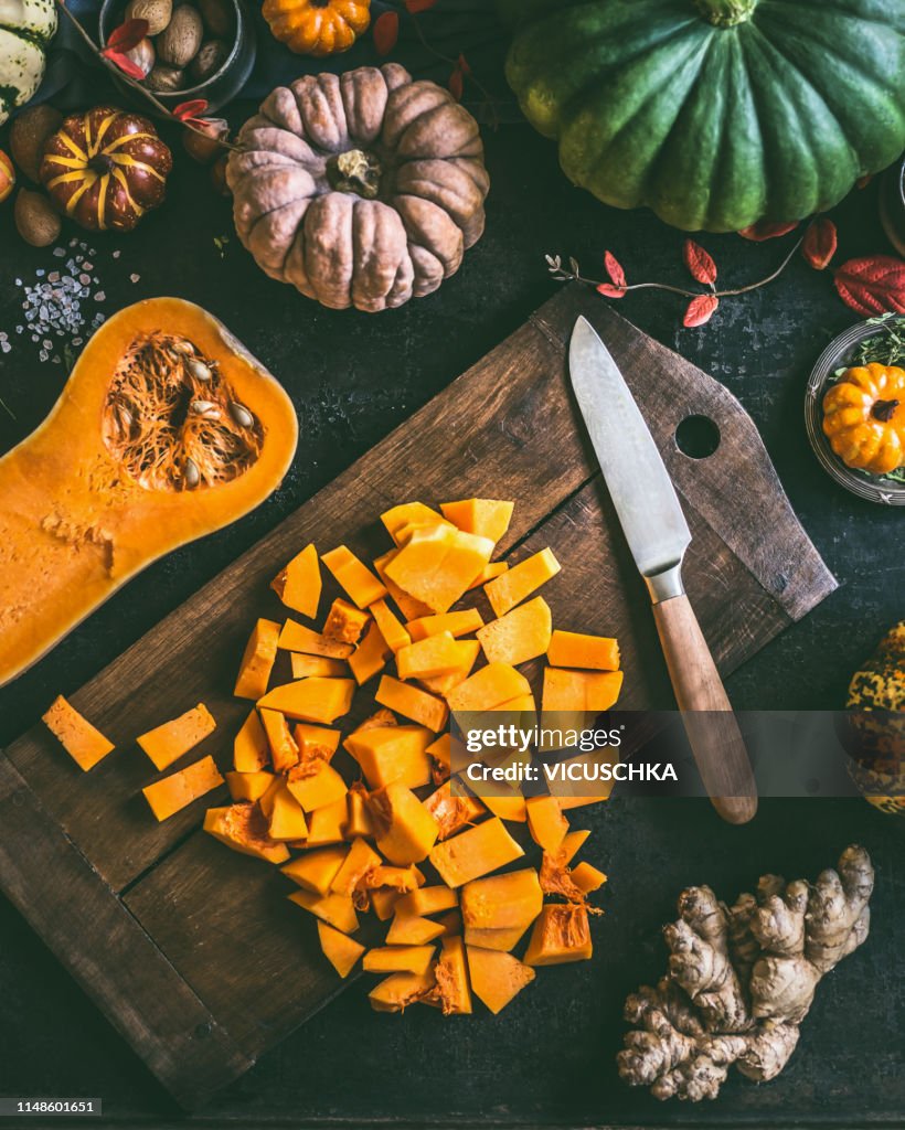 Diced ​​Pumpkin on cutting board with knife